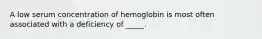 A low serum concentration of hemoglobin is most often associated with a deficiency of _____.