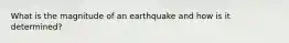 What is the magnitude of an earthquake and how is it determined?