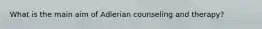 What is the main aim of Adlerian counseling and therapy?