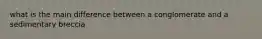 what is the main difference between a conglomerate and a sedimentary breccia