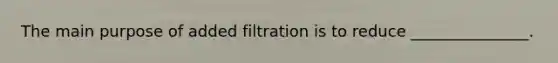 The main purpose of added filtration is to reduce _______________.