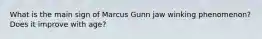 What is the main sign of Marcus Gunn jaw winking phenomenon? Does it improve with age?