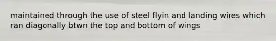 maintained through the use of steel flyin and landing wires which ran diagonally btwn the top and bottom of wings