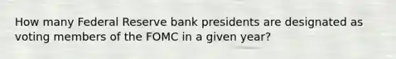 How many Federal Reserve bank presidents are designated as voting members of the FOMC in a given year?