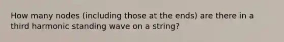 How many nodes (including those at the ends) are there in a third harmonic standing wave on a string?