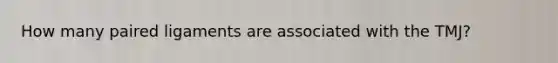 How many paired ligaments are associated with the TMJ?