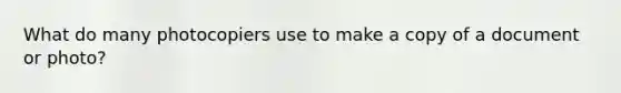What do many photocopiers use to make a copy of a document or photo?