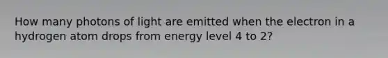 How many photons of light are emitted when the electron in a hydrogen atom drops from energy level 4 to 2?