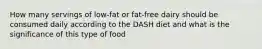 How many servings of low-fat or fat-free dairy should be consumed daily according to the DASH diet and what is the significance of this type of food