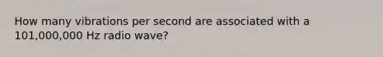How many vibrations per second are associated with a 101,000,000 Hz radio wave?