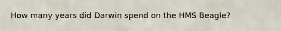 How many years did Darwin spend on the HMS Beagle?