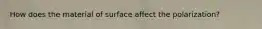 How does the material of surface affect the polarization?