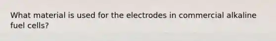 What material is used for the electrodes in commercial alkaline fuel cells?