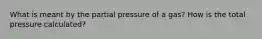 What is meant by the partial pressure of a gas? How is the total pressure calculated?