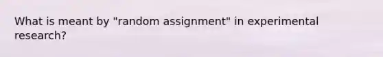 What is meant by "random assignment" in experimental research?