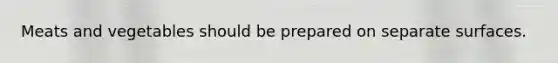 Meats and vegetables should be prepared on separate surfaces.