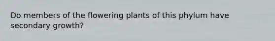 Do members of the flowering plants of this phylum have secondary growth?