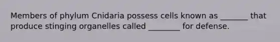 Members of phylum Cnidaria possess cells known as _______ that produce stinging organelles called ________ for defense.