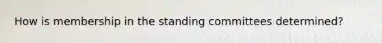 How is membership in the standing committees determined?