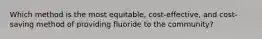 Which method is the most equitable, cost-effective, and cost-saving method of providing fluoride to the community?