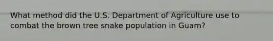 What method did the U.S. Department of Agriculture use to combat the brown tree snake population in Guam?