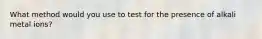 What method would you use to test for the presence of alkali metal ions?