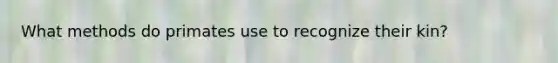 What methods do primates use to recognize their kin?