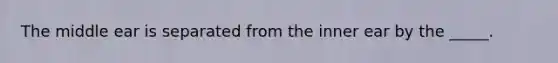 The middle ear is separated from the inner ear by the _____.