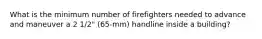 What is the minimum number of firefighters needed to advance and maneuver a 2 1/2" (65-mm) handline inside a building?