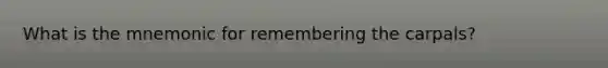 What is the mnemonic for remembering the carpals?