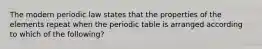 The modern periodic law states that the properties of the elements repeat when the periodic table is arranged according to which of the following?