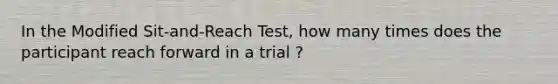 In the Modified Sit-and-Reach Test, how many times does the participant reach forward in a trial ?