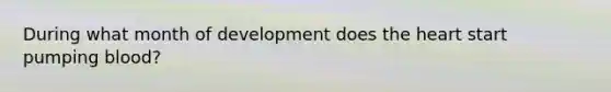 During what month of development does the heart start pumping blood?