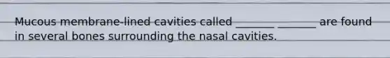 Mucous membrane-lined cavities called _______ _______ are found in several bones surrounding the nasal cavities.