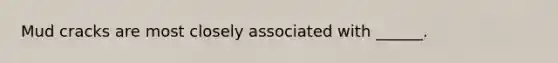 Mud cracks are most closely associated with ______.