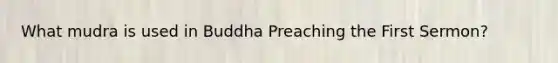 What mudra is used in Buddha Preaching the First Sermon?