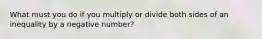 What must you do if you multiply or divide both sides of an inequality by a negative number?