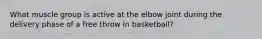 What muscle group is active at the elbow joint during the delivery phase of a free throw in basketball?