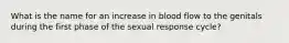 What is the name for an increase in blood flow to the genitals during the first phase of the sexual response cycle?