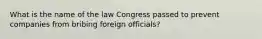 What is the name of the law Congress passed to prevent companies from bribing foreign officials?