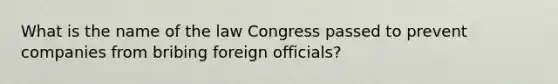 What is the name of the law Congress passed to prevent companies from bribing foreign officials?