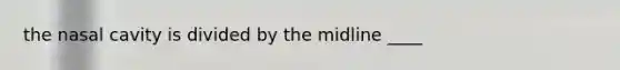 the nasal cavity is divided by the midline ____