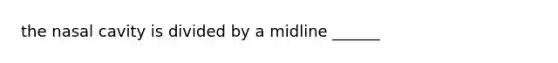 the nasal cavity is divided by a midline ______