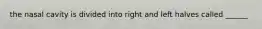 the nasal cavity is divided into right and left halves called ______