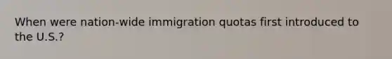 When were nation-wide immigration quotas first introduced to the U.S.?