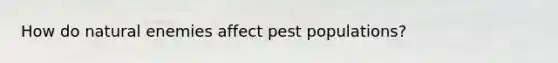 How do natural enemies affect pest populations?