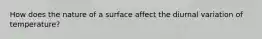 How does the nature of a surface affect the diurnal variation of temperature?