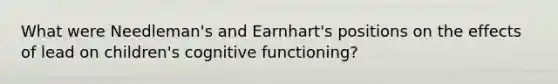 What were Needleman's and Earnhart's positions on the effects of lead on children's cognitive functioning?