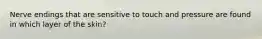 Nerve endings that are sensitive to touch and pressure are found in which layer of the skin?