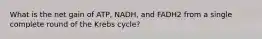 What is the net gain of ATP, NADH, and FADH2 from a single complete round of the Krebs cycle?